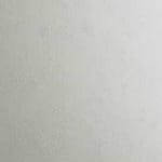 produktbild på slät moden kökslucka i Pet laminat med stenstruktur. Stenen liknar kalksten.