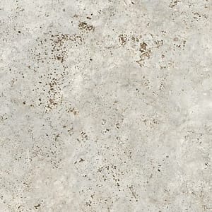 Närbild på keramisk sten Sabbia från dekton. Liknar naturstenen travertine i toner.