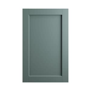 Närbild på ramlucka i lackad grön.