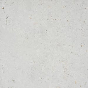 Närbild på stenen pietra ava från cosentino, en dekton keramisksten. Ljusa och nordiskatoner.