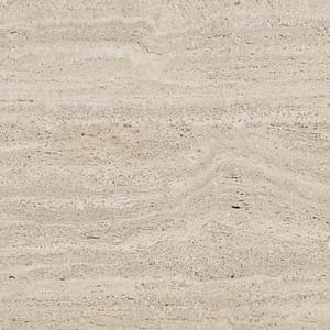 Närbild på Dekton keramisksten som liknar naturstenen Travertine. En ljus sandfärg med diskreta mönster och ådringar.