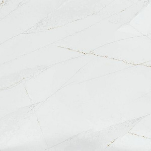 Närbild på kompositsten, vid med guldig ådring.